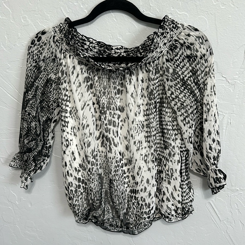 New York & Company black and white sheer blouse. Work to leisure time. Size XS